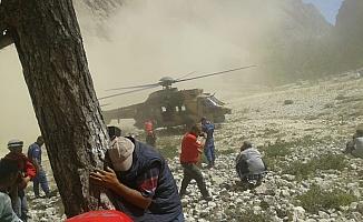 Kayalıklara düşen paraşütçü 20 saat sonra kurtarıldı